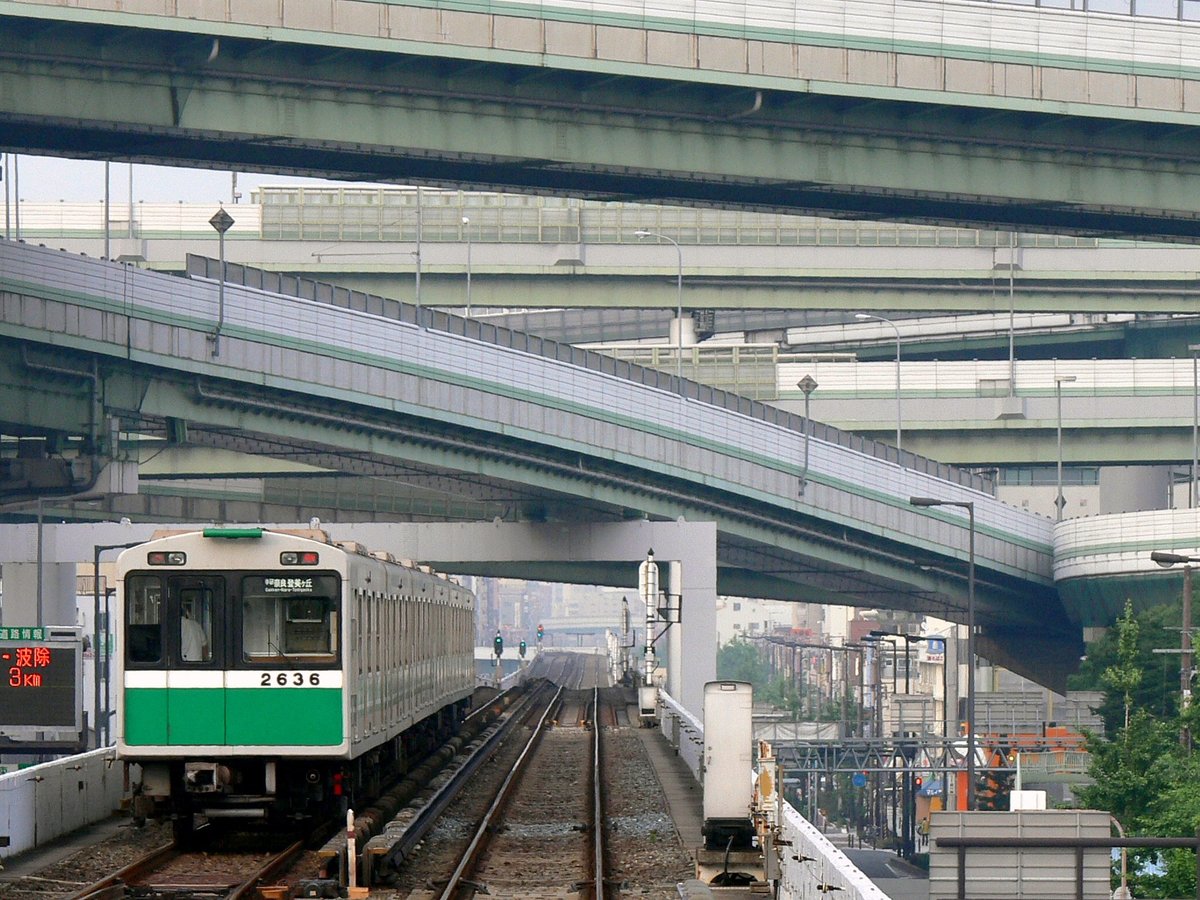 Osaka Subway Chūō Line Type 20 EMU at Osakako Station platform in Japan