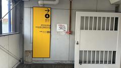Osaka Metro Osaka Port Station platform view with train and signage