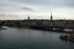 Evening view of Gamla Stan with historic buildings and calm water
