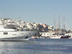 Seaside near Athens with rocky coastline and clear blue water on a sunny day