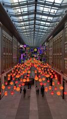 China Town in Dubai Mall with vibrant decorations and shopper crowd