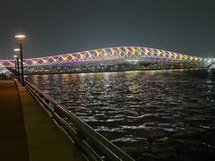 Sabarmati riverfront and Atal Pedestrian Bridge illuminated with colorful lights at night