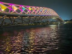 Sabarmati riverfront and Atal Pedestrian Bridge illuminated with colorful lights at night