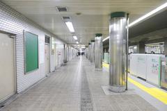 Osaka Metro Awaza Station Chuo Line Platform 2 with trains and passengers