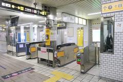 Awaza Station West-North Ticket Gate with commuters at Osaka Metro