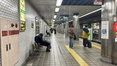 Osaka Metro Awaza Station platform with train