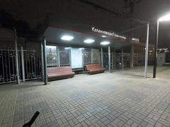 Night view of a railway shelter at Kalanchevskaya station with illuminated signs and tracks in Moscow