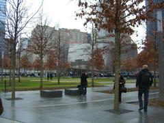 Aerial view of the National September 11 Memorial & Museum in Manhattan featuring the twin reflecting pools, North Pool on the left and South Pool on the right, captured on December 6, 2011