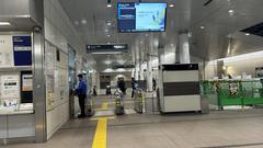 Osaka Metro Cosmosquare Station East Ticket Gate with People