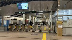 Cosmosquare Station on Osaka Metro with modern architecture and escalators