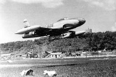 Lockheed F-80C-10-LO Shooting Star fighter jet taking off from Itazuke Air Base Japan in 1950