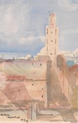 View of Koutoubia Mosque in Marrakech with palm trees and blue sky