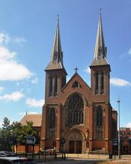 Exterior view of St Chad's Cathedral in Birmingham with blue sky
