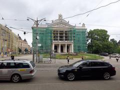 Renovation of Mahen Theatre facade with scaffolding and workers