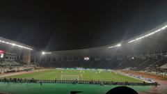 A soccer match between Qarabağ FK and BK Häcken with players competing for the ball on the field