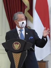 Malaysian Prime Minister Muhyiddin Yassin giving press statement at Merdeka Palace Indonesia 2021