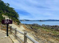 Scenic view of Chidorigahama beach with calm sea and clear sky