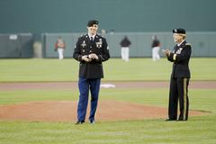 Sgt. Ryan Barger throwing ceremonial first pitch at Baltimore Orioles MLB game