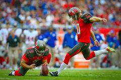 Connor Barth kicking a field goal for Tampa Bay Buccaneers during NFL military appreciation game