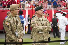 Command Sgt. Maj. William F. Thetford and Gen. Joseph Votel observing Tampa Bay Buccaneers pregame warmups at Raymond James Stadium