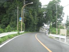 Saitama Prefecture Road 55 in Tokorozawa City with urban buildings and clear sky