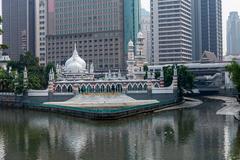 Sultan Abdul Samad Jamek Mosque and Kolam Biru in Kuala Lumpur by Klang River