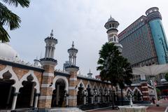 Sultan Abdul Samad Jamek Mosque in Kuala Lumpur with clear blue sky