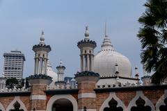 Sultan Abdul Samad Jamek Mosque in Kuala Lumpur with blue sky