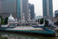 Sultan Abdul Samad Jamek Mosque and Kolam Biru in Kuala Lumpur viewed from southern bridge along Klang River