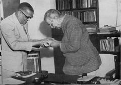 Sri Rajsekhar Bose receiving Honorary Degree Diploma from Vice-Chancellor at residence in 1957