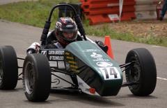 Curtin University of Technology 2005 Formula SAE racecar in black and red with sponsor logos