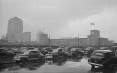 Cars reflected in rainwater on wet streets during a rainy day