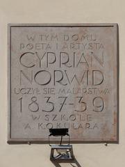Commemorative plaque dedicated to Cyprian Norwid on the facade of the Czapski Palace wing in Warsaw