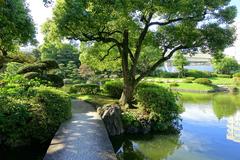 Old Yasuda Garden tranquil pond with traditional Japanese garden elements in Sumida, Tokyo