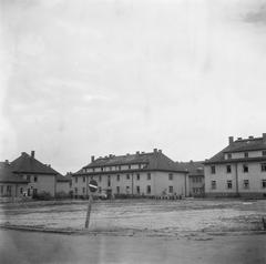 Building with inscription M.B. 57 and Red Cross symbol at Bergen-Belsen concentration camp in 1945