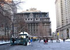 Looking north from Park Row showing IRT stair and Chambers Street near dusk on a sunny day