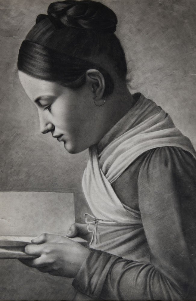 Young woman reading a book