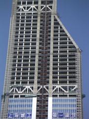 Shanghai Shimao International Plaza skyscraper under construction with visible steel truss structure and cranes