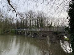 Minnewaterbrug bridge over a canal with historic buildings in the background