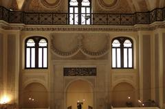Interior of Yeni Mosque in Thessaloniki with intricate Islamic architectural details and chandelier