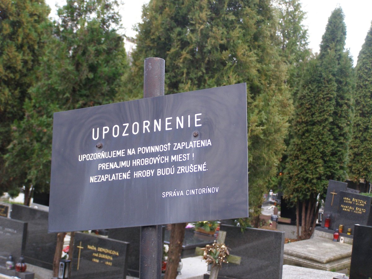 Warning sign for grave owners at Slávičie údolie cemetery in Bratislava, Slovakia