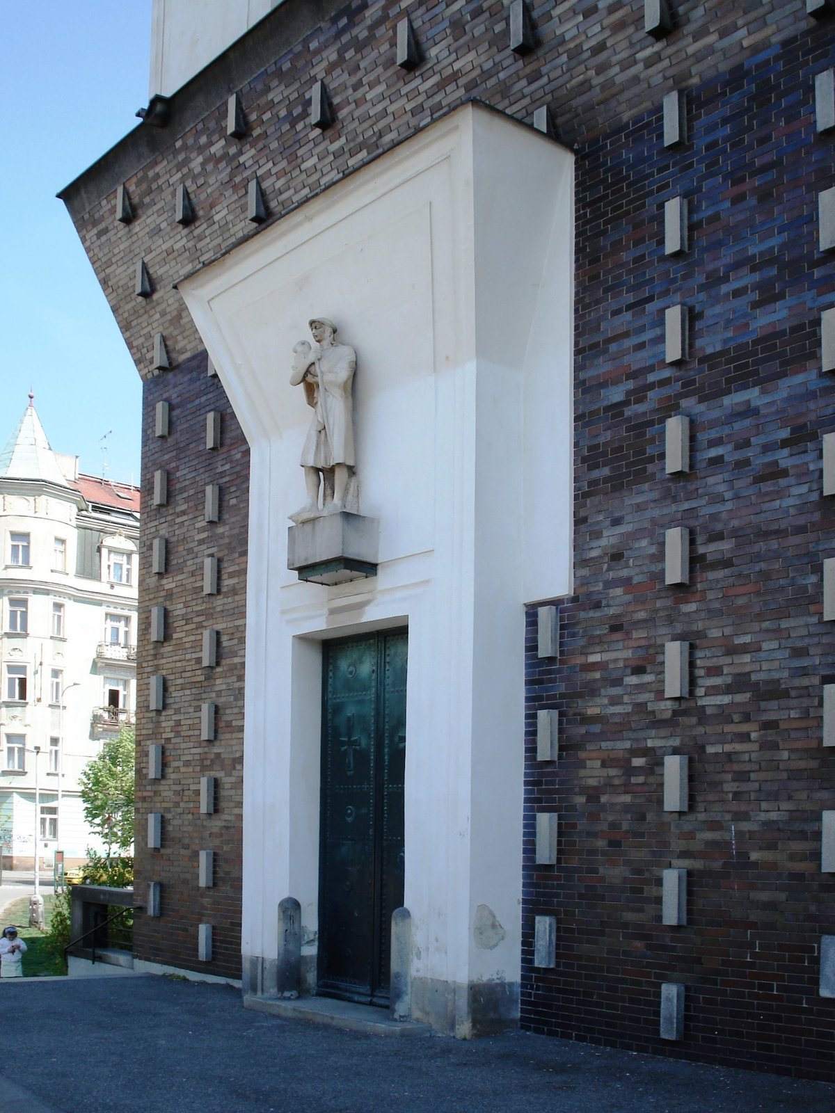 Lateral entrance of the Church of the Sacred Heart at George of Podebrady square in Prague