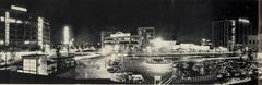 Night view of Osaka Station area in the 1950s with Hankyu and Hanshin department stores and Daini Seimei building