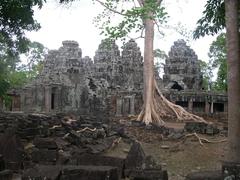 Ancient Banteay Kdei temple ruins with stone pillars and intricate carvings in Siem Reap