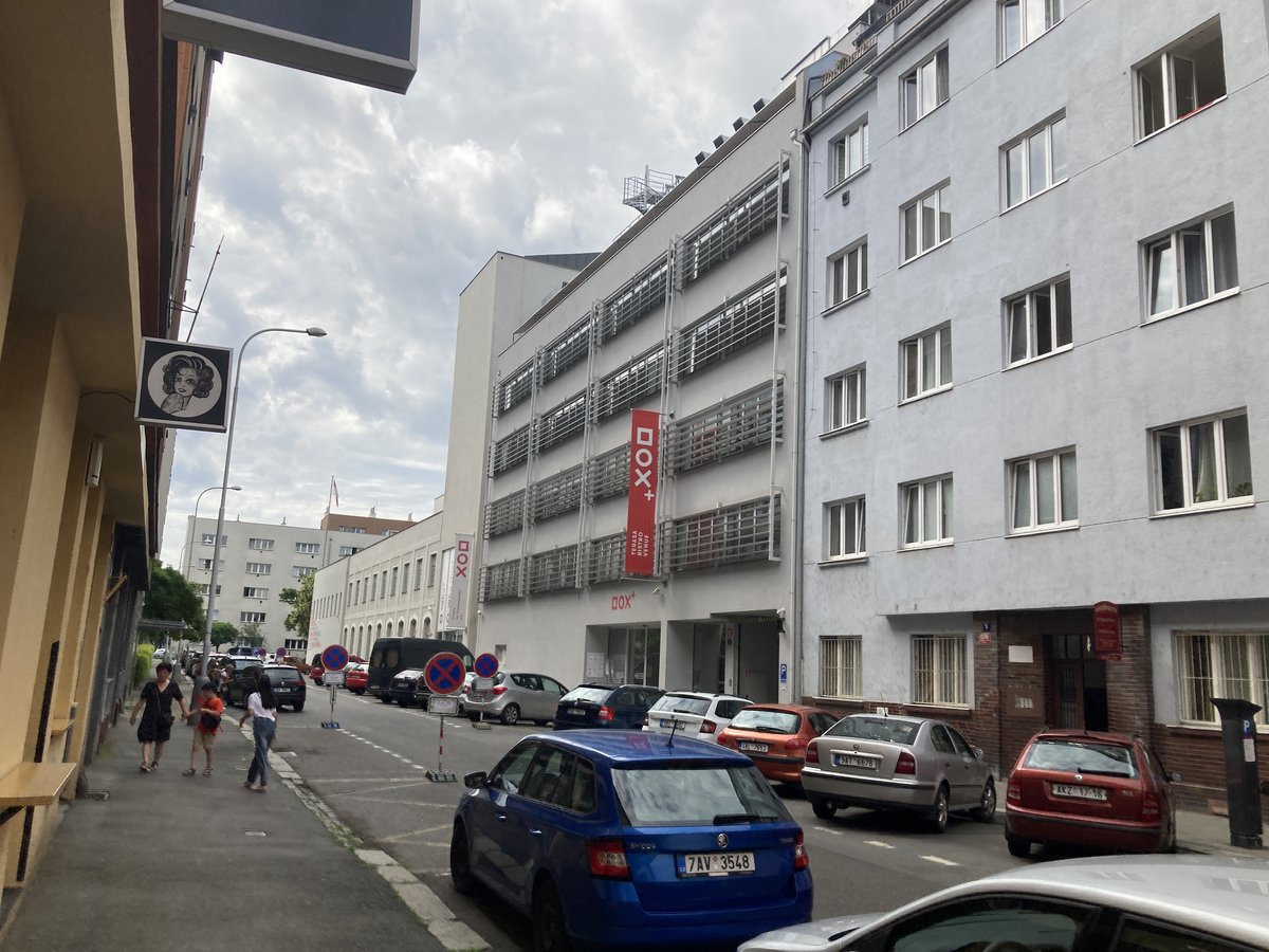 Exterior view of DOX Centre for Contemporary Art building at dusk with modern architectural design