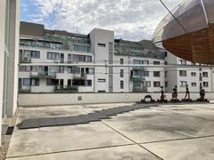 DOX Centre for Contemporary Art building exterior with modern architectural design and large colorful window