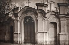 Historic view of Vilnia's Jurawski Alley featuring the Church of St. George and Carmelite Monastery