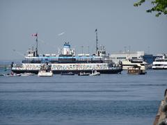 Ferries docked in Toronto harbour on a clear day