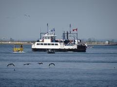 Ongiara ferry in Toronto harbour with Toronto skyline in background