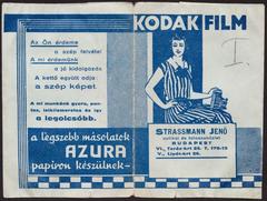 Historic storefront of Strassmann Jenő optical and photo specialty shop at Teréz körút 25 and Szent István (Lipót) körút 26 in Budapest